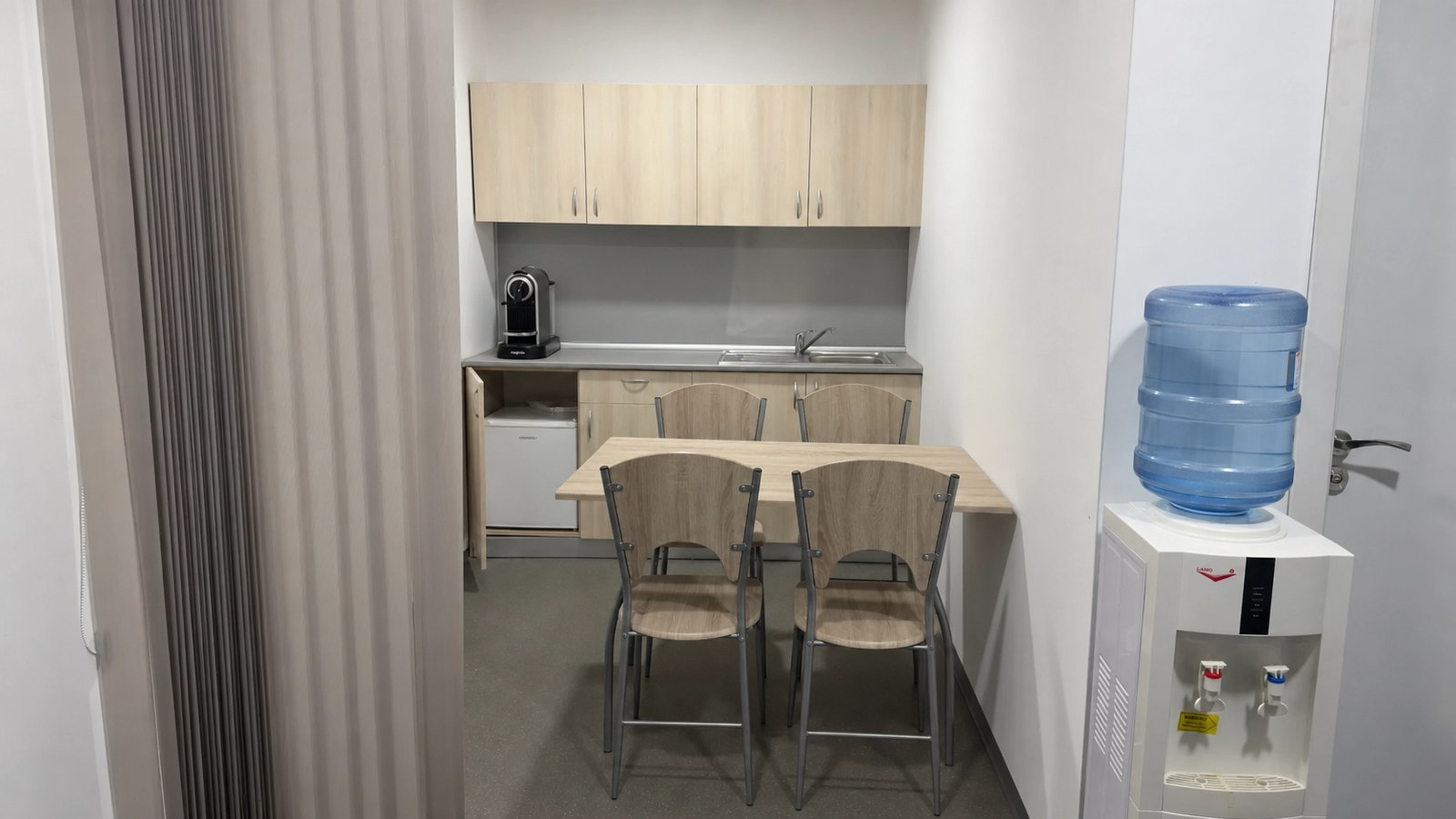 Private kitchenette and dining area on the office floor